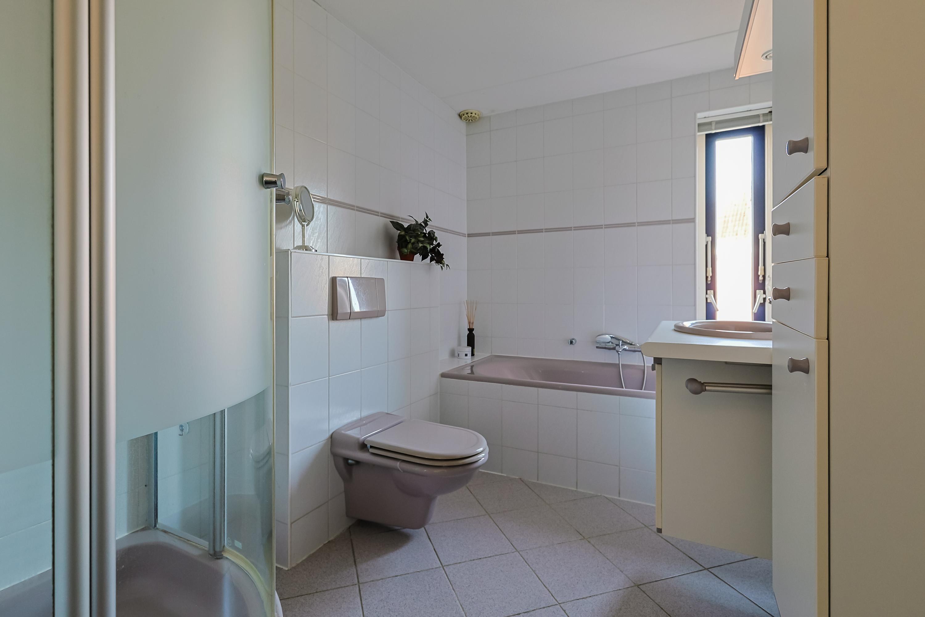 Eengezinswoning Twee onder een kapwoning De Til 60, Koudekerk aan den Rijn