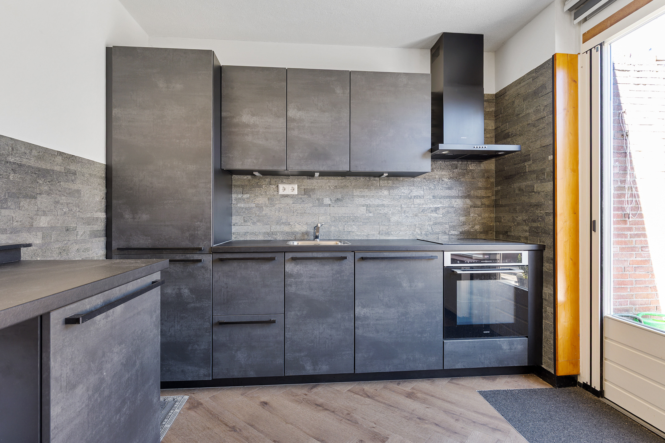 Eengezinswoning Tussenwoning Julianalaan 3, Woubrugge