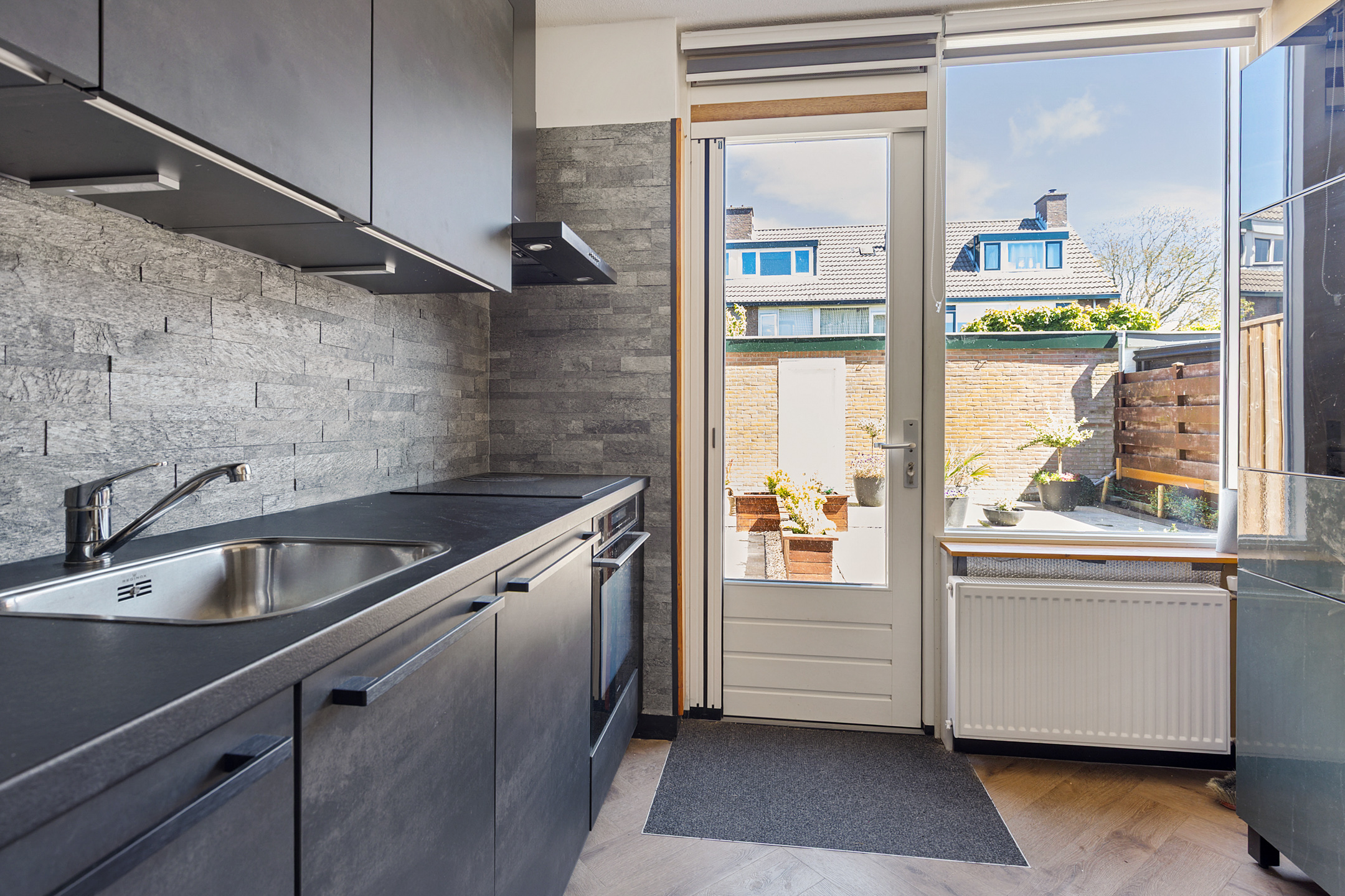 Eengezinswoning Tussenwoning Julianalaan 3, Woubrugge