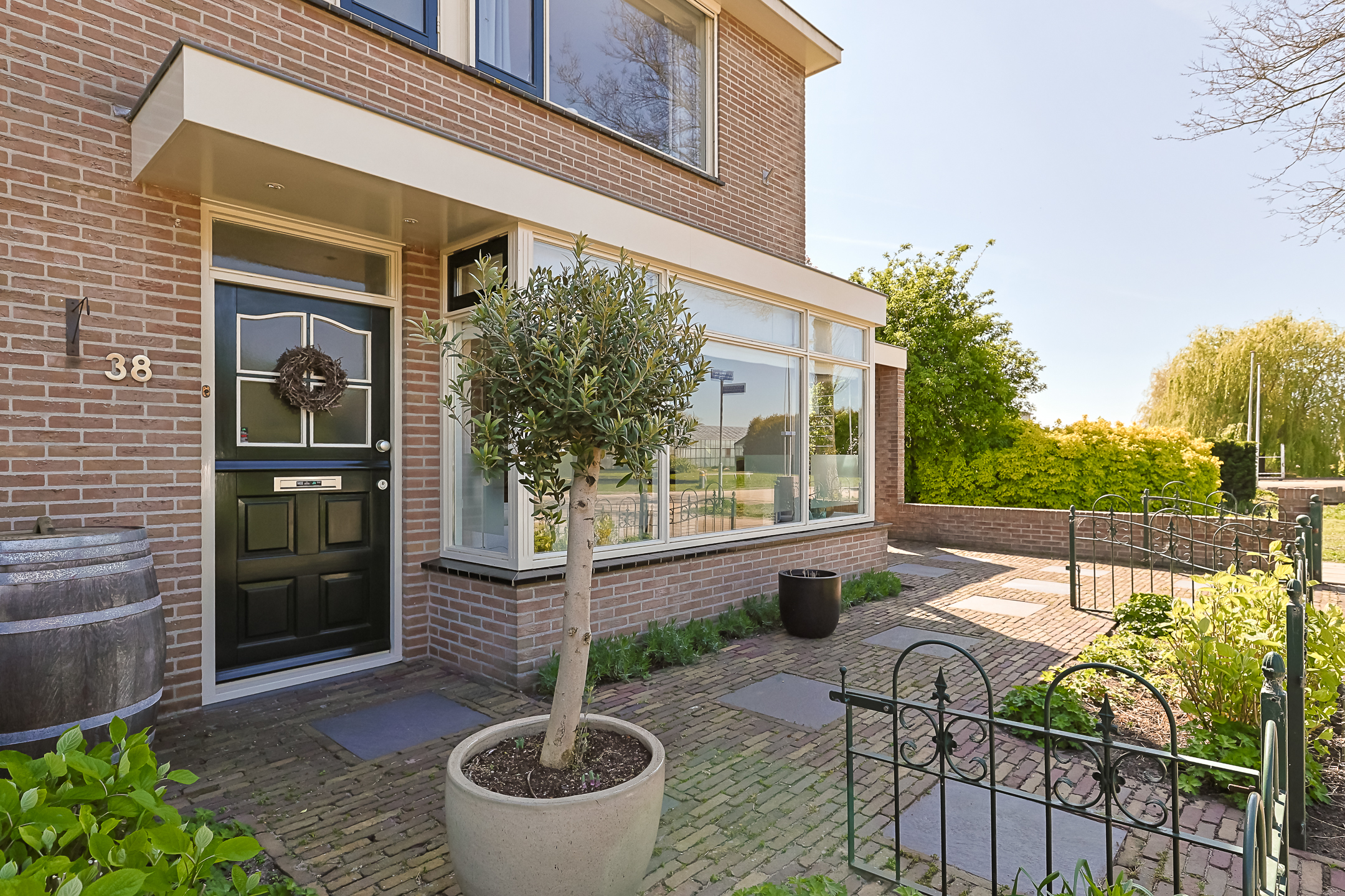 Eengezinswoning Hoekwoning Van Woudeweg 38, Woubrugge