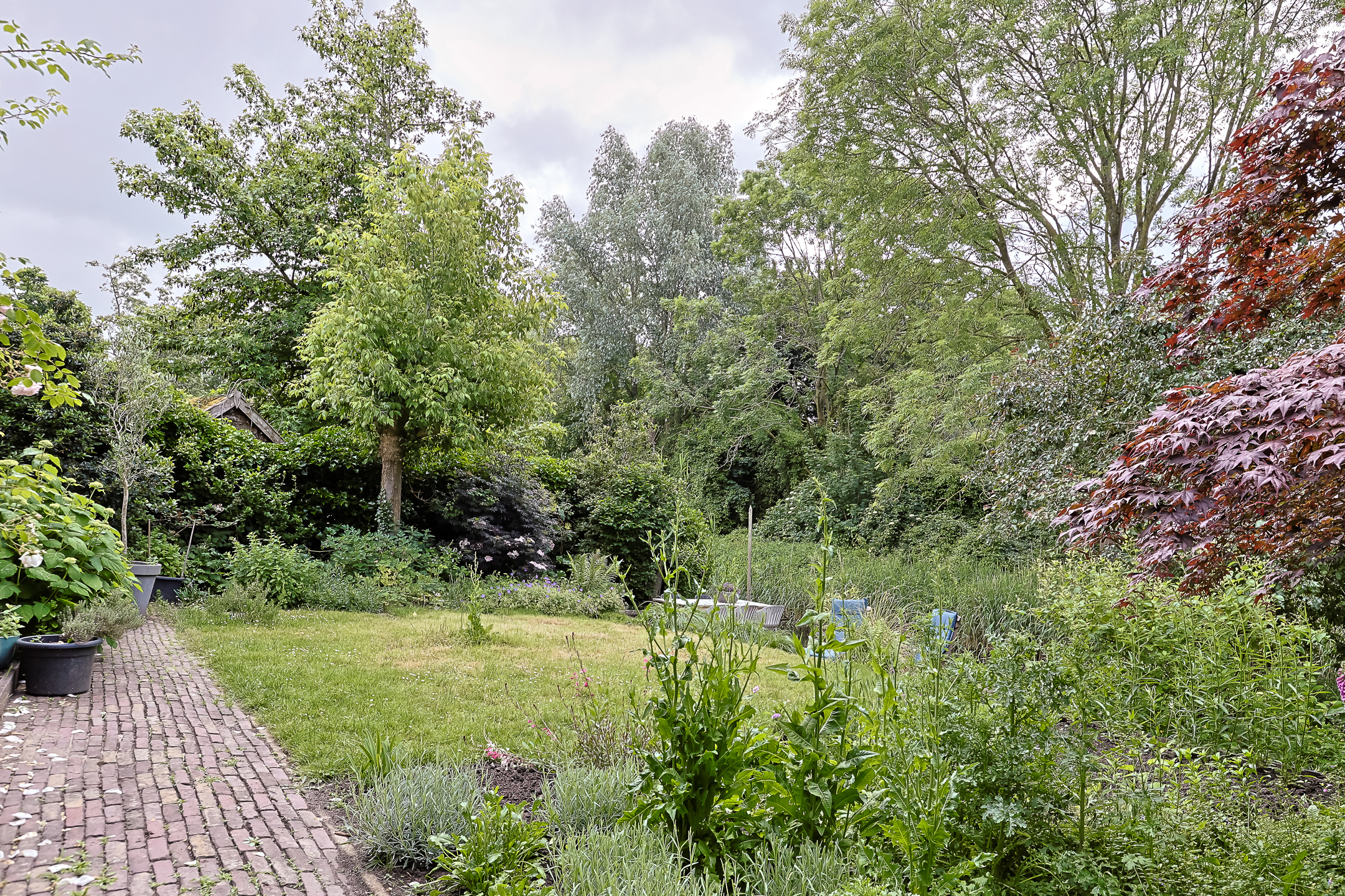 Eengezinswoning Twee onder een kapwoning Helmhof 52, Alphen aan den Rijn