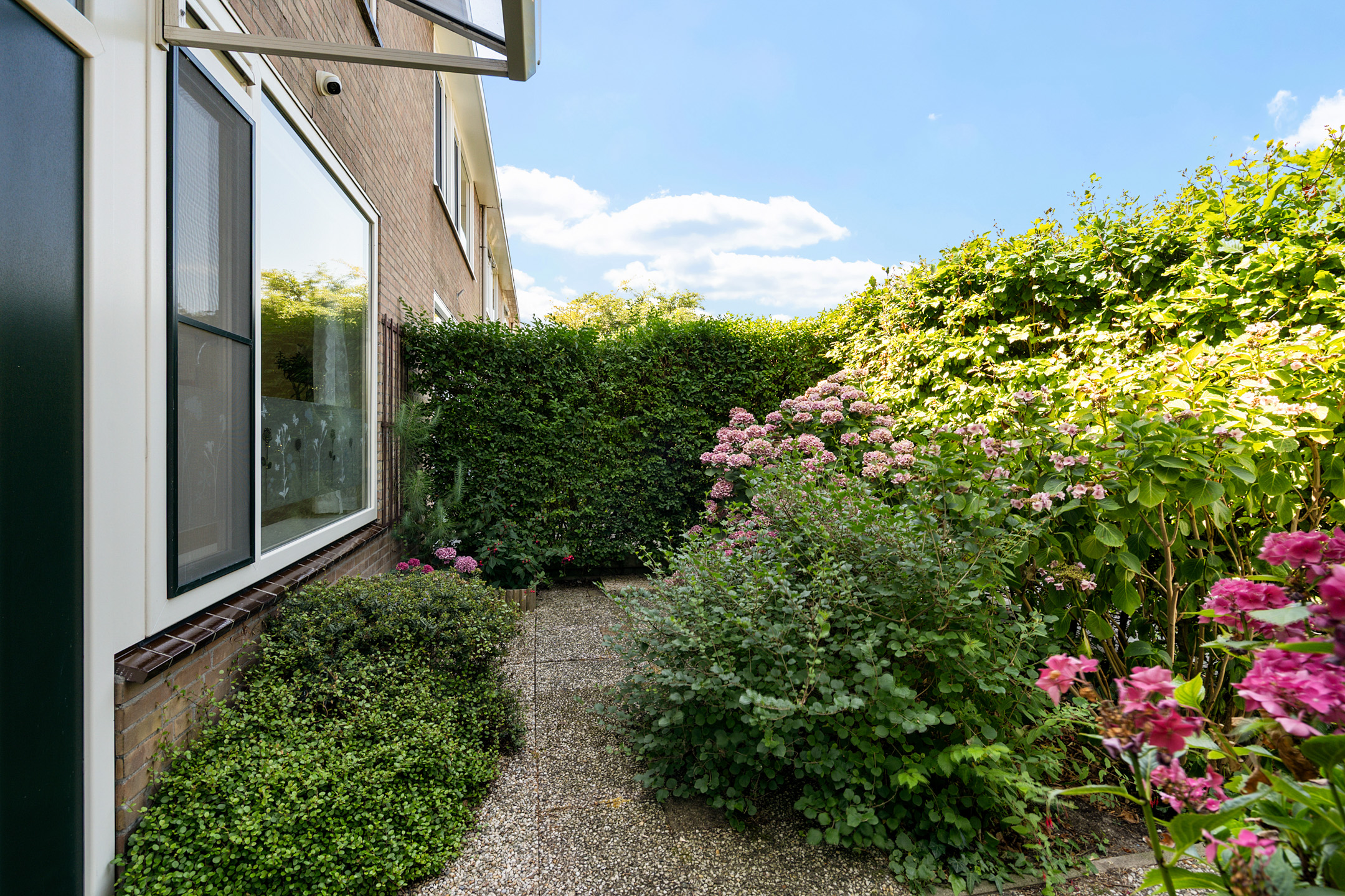 Eengezinswoning Tussenwoning Van Woudeweg 28, Woubrugge